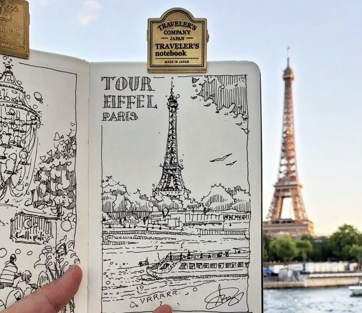 4d6c3ec4-6ad0-4305-9474-869436467676 Sketch of the Eiffel Tower in Paris displayed next to the actual tower against a clear sky background. | Sky Rye Design Sketch of the Eiffel Tower in Paris displayed next to the actual tower against a clear sky background.