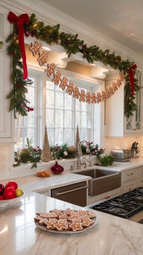 50 Best DIY Christmas Kitchen Decor Ideas Festive kitchen with gingerbread decor, garland, and Christmas cookies on a marble counter by the window. | Sky Rye Design Festive kitchen with gingerbread decor, garland, and Christmas cookies on a marble counter by the window.