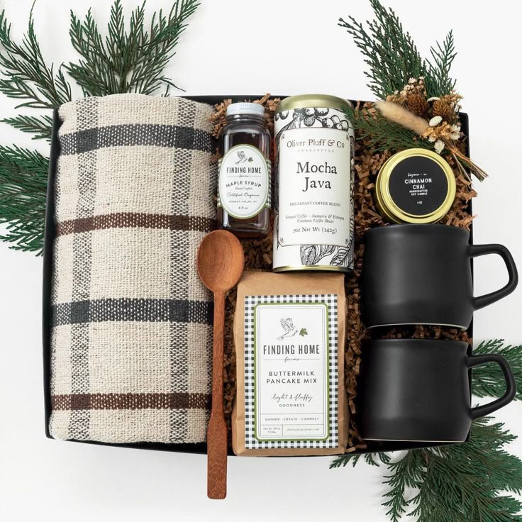_ 6 Gift box with coffee, pancake mix, syrup, mugs, tea towel, and festive greenery, perfect for cozy mornings. | Sky Rye Design Gift box with coffee, pancake mix, syrup, mugs, tea towel, and festive greenery, perfect for cozy mornings.