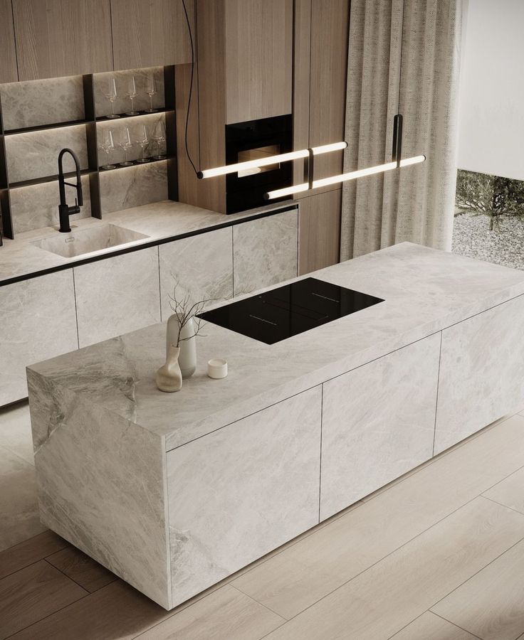 _ 6 Modern kitchen with marble island, sleek countertops, built-in appliances, and contemporary lighting. | Sky Rye Design Modern kitchen with marble island, sleek countertops, built-in appliances, and contemporary lighting.