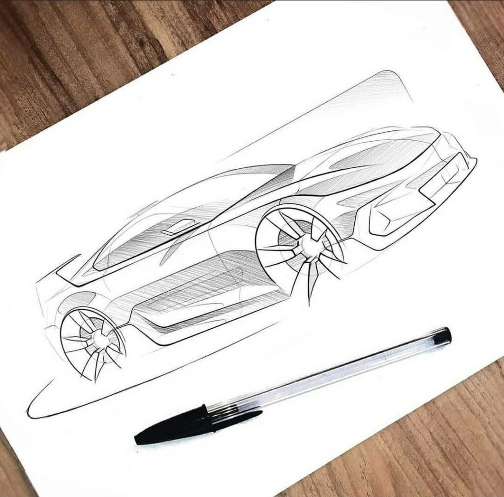 68a68073b7eb8df60982c8d17d6a172d Concept car sketch with dynamic lines on paper and pen resting nearby on a wooden surface. | Sky Rye Design Concept car sketch with dynamic lines on paper and pen resting nearby on a wooden surface.