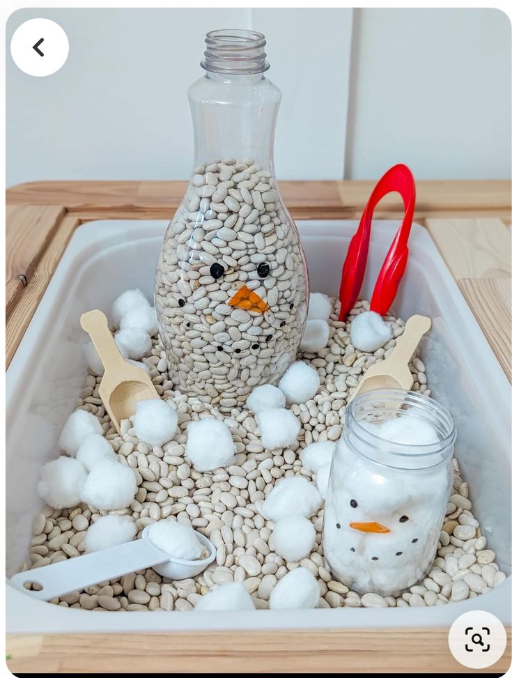 _ 7 DIY snowmen in sensory bin with beans, cotton balls, and spoons for imaginative play and fine motor skill development. | Sky Rye Design DIY snowmen in sensory bin with beans, cotton balls, and spoons for imaginative play and fine motor skill development.