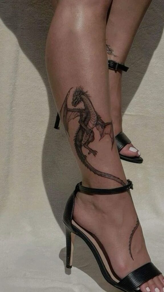 _ 7 Dragon tattoo on woman's leg wearing black high heels. | Sky Rye Design Dragon tattoo on woman's leg wearing black high heels.