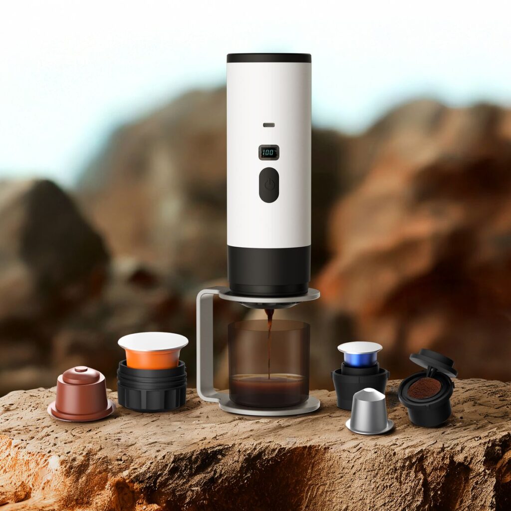 7302febde6f95d186f8153976384e83f Portable coffee maker with various capsules brews espresso on a rocky outdoor setting. | Sky Rye Design Portable coffee maker with various capsules brews espresso on a rocky outdoor setting.