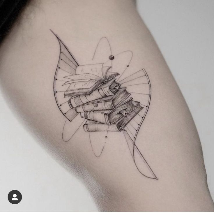 _ 8 Tattoo of stacked books with artistic DNA design on arm, symbolizing knowledge and evolution. | Sky Rye Design Tattoo of stacked books with artistic DNA design on arm, symbolizing knowledge and evolution.