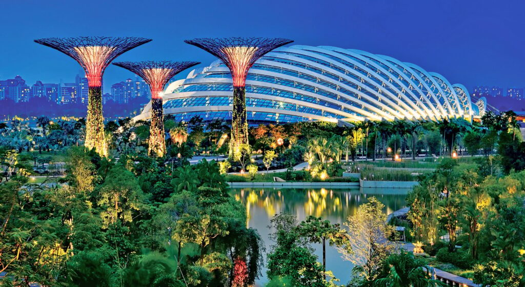 8594123469_9a29317c0e_o Futuristic garden at night with illuminated tree structures and modern domed building, reflecting in a tranquil pond. | Sky Rye Design Futuristic garden at night with illuminated tree structures and modern domed building, reflecting in a tranquil pond.