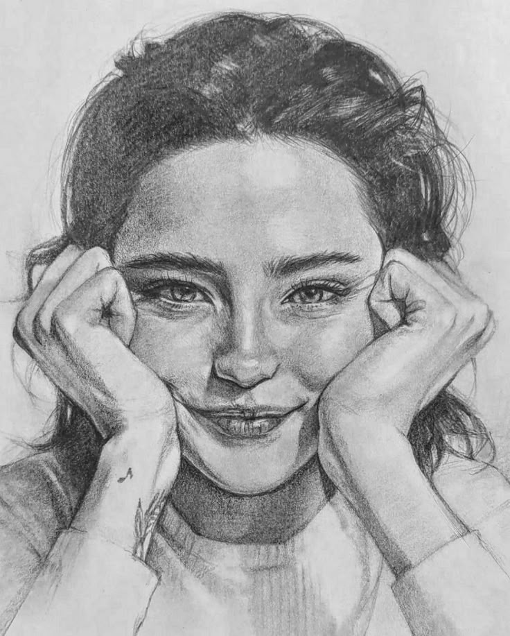 Pencil sketch of a smiling woman with hands on her cheeks, detailed and expressive portrait art.