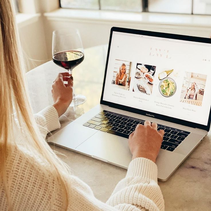 About Lexi Stephens Wine Educator Lexis Wine List Person with wine using a laptop displaying a lifestyle blog, viewed from behind. | Sky Rye Design Person with wine using a laptop displaying a lifestyle blog, viewed from behind.