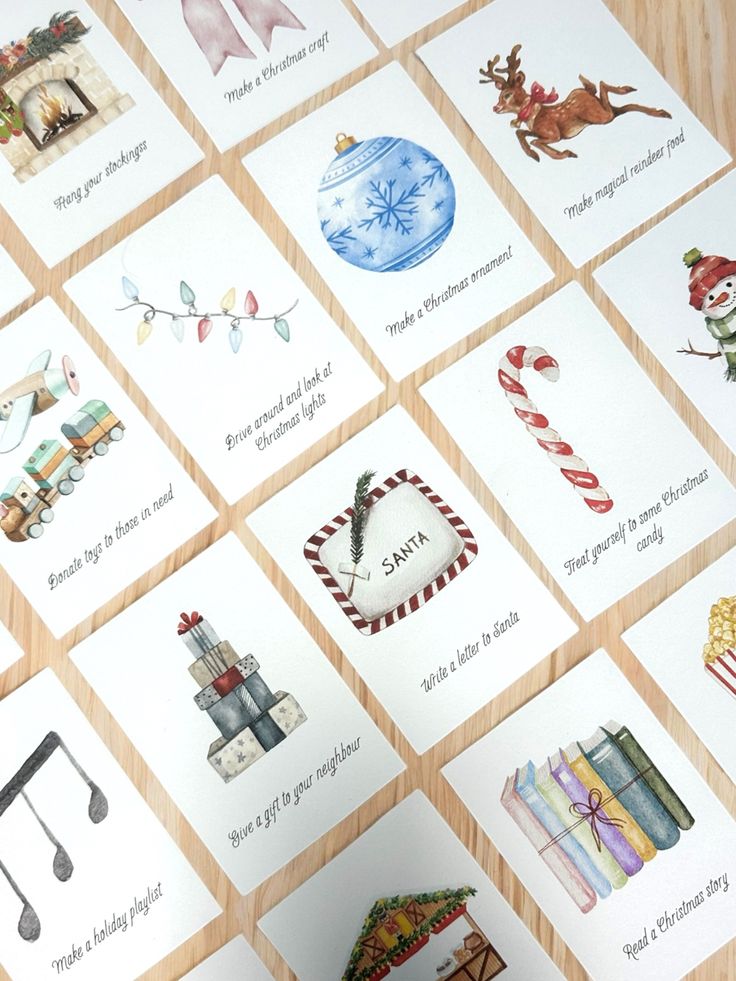 Christmas activity cards laid out on a table, featuring festive illustrations and fun holiday tasks.