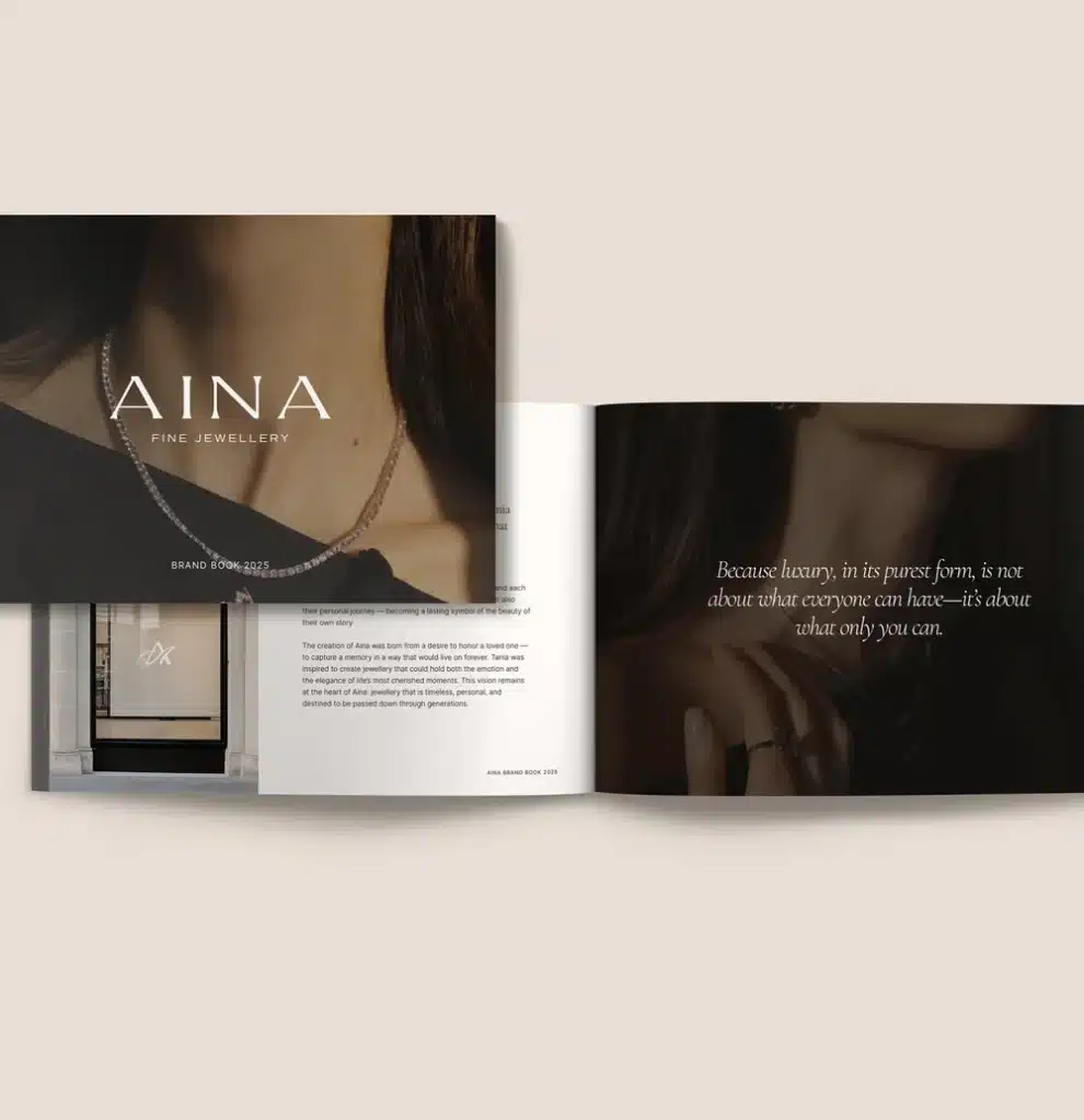 Aina Fine Jewellery brand book showcasing luxury necklaces and elegant design with the quote about exclusive luxury.