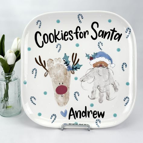 Christmas Buddies Platter Plate for Santa's cookies with hand-painted reindeer and snowman, personalized with Andrew. Tulips in a vase beside. | Sky Rye Design Plate for Santa's cookies with hand-painted reindeer and snowman, personalized with Andrew. Tulips in a vase beside.