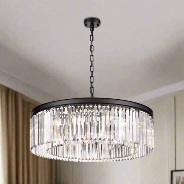 Elegant crystal chandelier with modern design hanging from a ceiling.