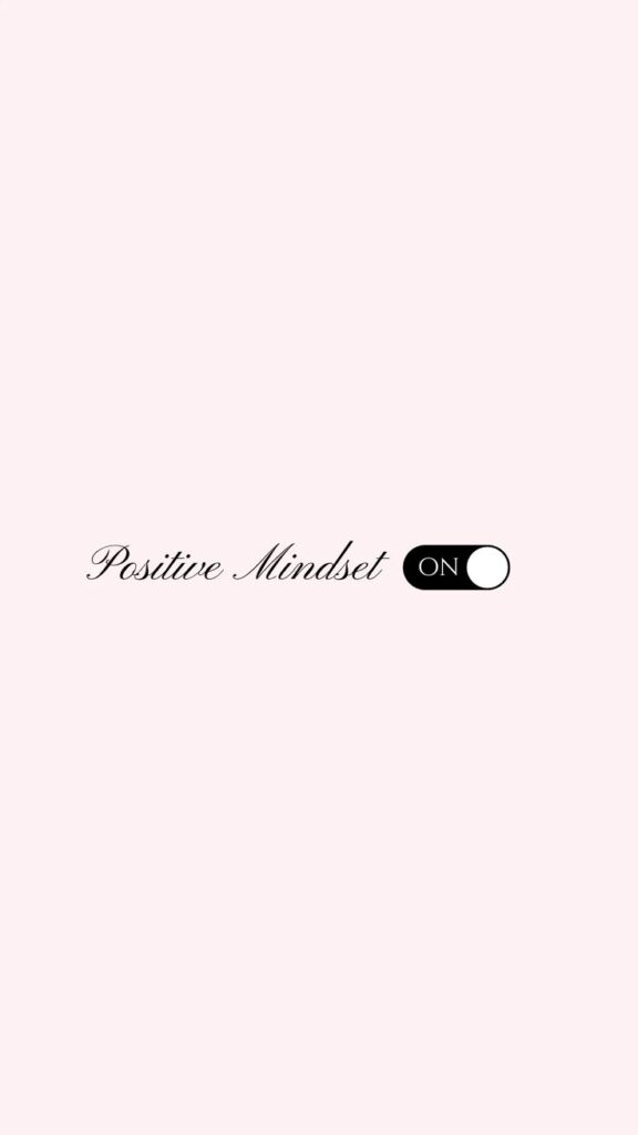 Cute Pink Positive Aesthetic Wallpaper Positive Mindset switch on against a light pink background, promoting positivity and mental wellness. | Sky Rye Design Positive Mindset switch on against a light pink background, promoting positivity and mental wellness.