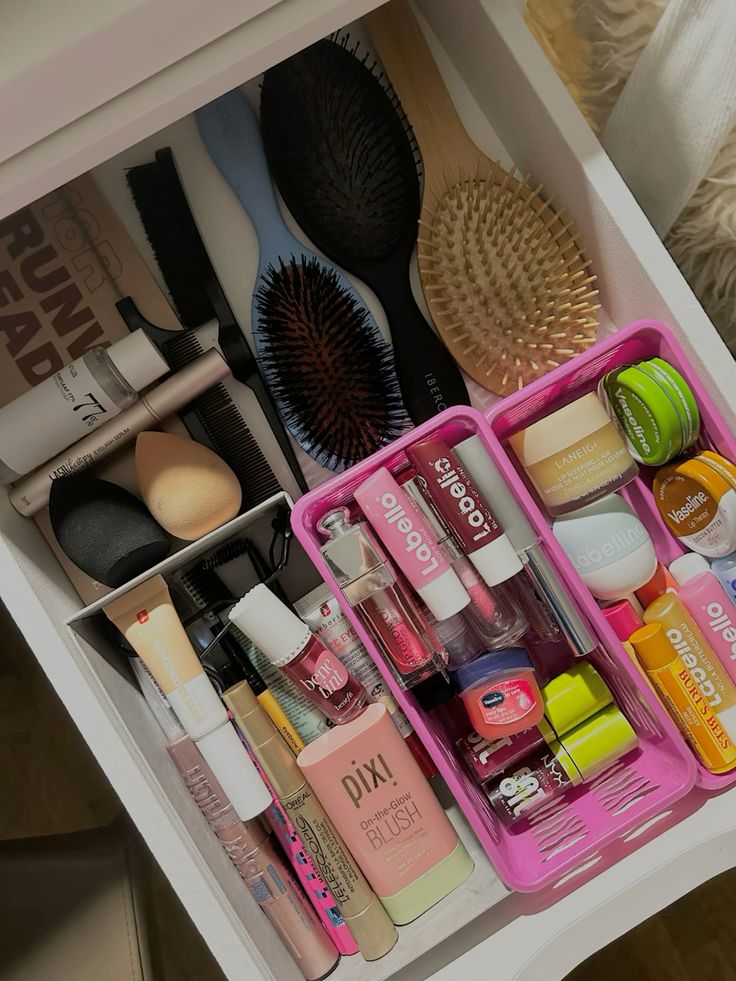Desk organisers Organized makeup drawer with brushes, lip balms, cosmetics, and beauty products in compartments for easy access. | Sky Rye Design Organized makeup drawer with brushes, lip balms, cosmetics, and beauty products in compartments for easy access.