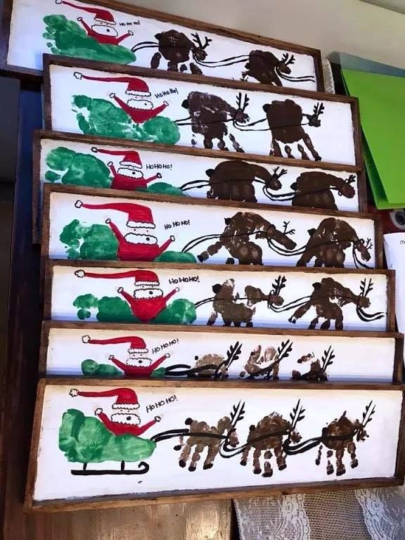 Disney Frozen 2 Kristoff Lost In The Woods Band Youth T-Shirt Children's handprint art of Santa in a sleigh with reindeer; Christmas craft idea. | Sky Rye Design Children's handprint art of Santa in a sleigh with reindeer; Christmas craft idea.