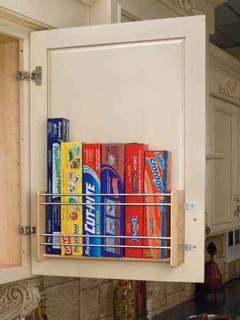 Foil and Wrap Organizer - 21_ Kitchen cabinet door organizer holding various boxed wraps for easy storage and access. | Sky Rye Design Kitchen cabinet door organizer holding various boxed wraps for easy storage and access.