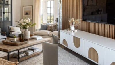 Modern living room with cozy seating, wooden coffee table, white TV console, and stylish decor elements.