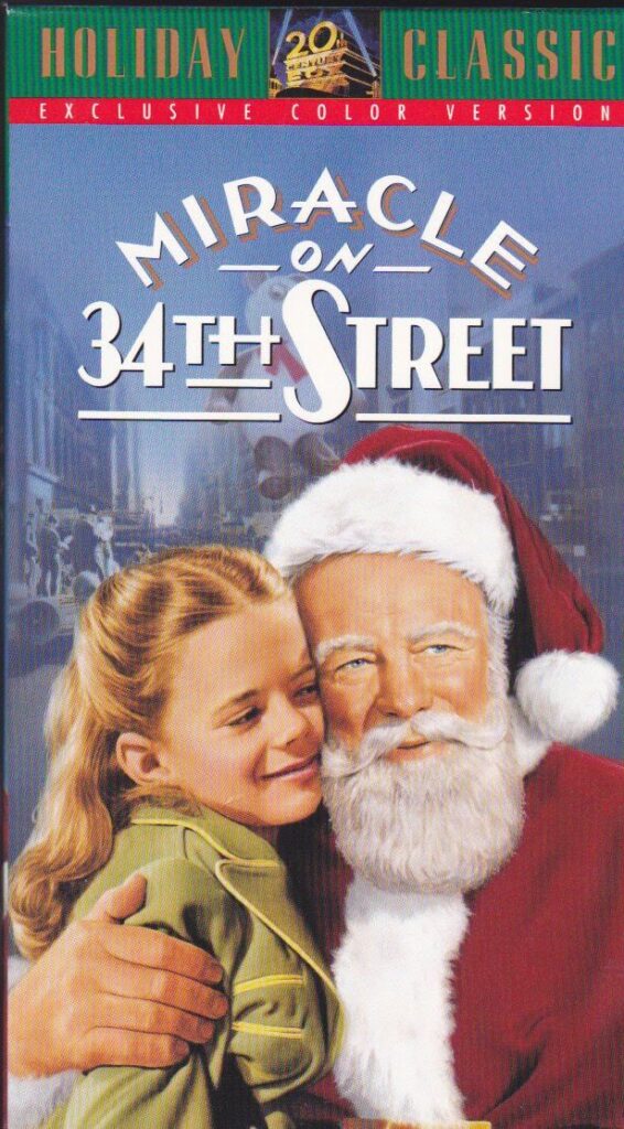 Miracle on 34th Street Exclusive Color Version VHS 11_2_93 Miracle on 34th Street DVD cover with Santa Claus and a smiling child, holiday classic movie theme. | Sky Rye Design Miracle on 34th Street DVD cover with Santa Claus and a smiling child, holiday classic movie theme.