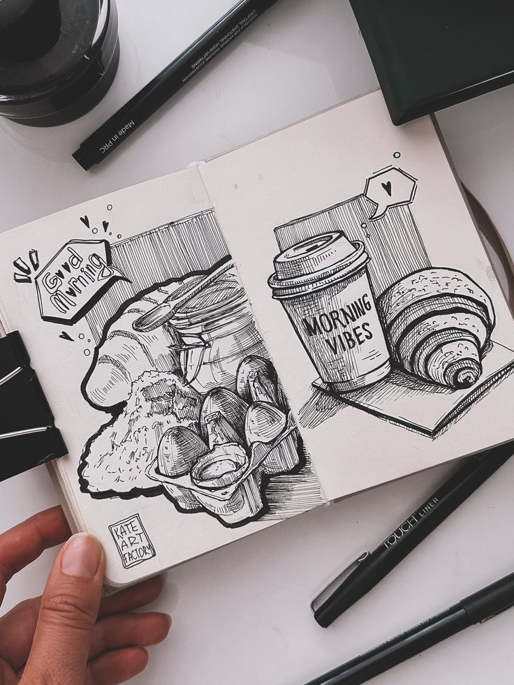 Sketch of breakfast items: coffee cup, croissant, eggs, and bread with Morning Vibes and Good Morning text.