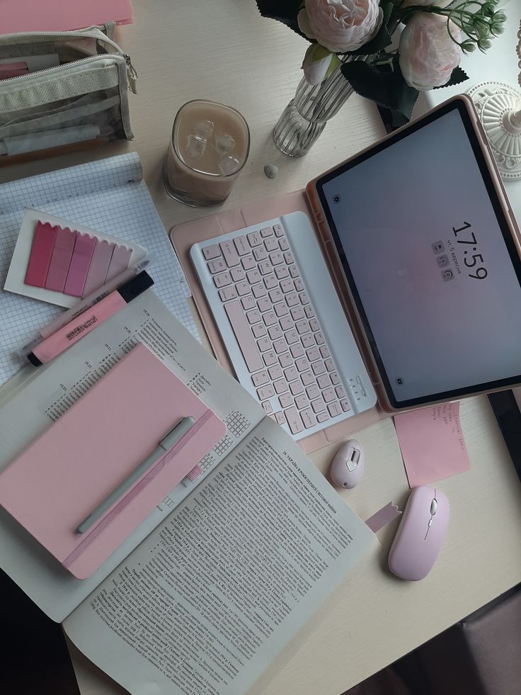 Study Aesthetic _ That Girl College Planner Pink-themed workspace with a tablet, keyboard, notepad, books, and flowers on a desk for a cozy study setup. | Sky Rye Design Pink-themed workspace with a tablet, keyboard, notepad, books, and flowers on a desk for a cozy study setup.