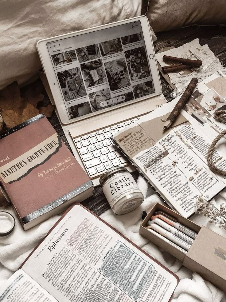 Study inspiration Cozy workspace with tablet, books, notes, and pens creating a warm, studious atmosphere. | Sky Rye Design Cozy workspace with tablet, books, notes, and pens creating a warm, studious atmosphere.
