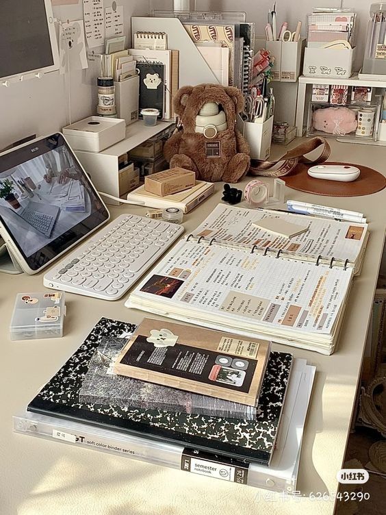 Study Cozy study desk with planner, tablet, and keyboard, organized with stationery and a teddy bear for decor. | Sky Rye Design Cozy study desk with planner, tablet, and keyboard, organized with stationery and a teddy bear for decor.