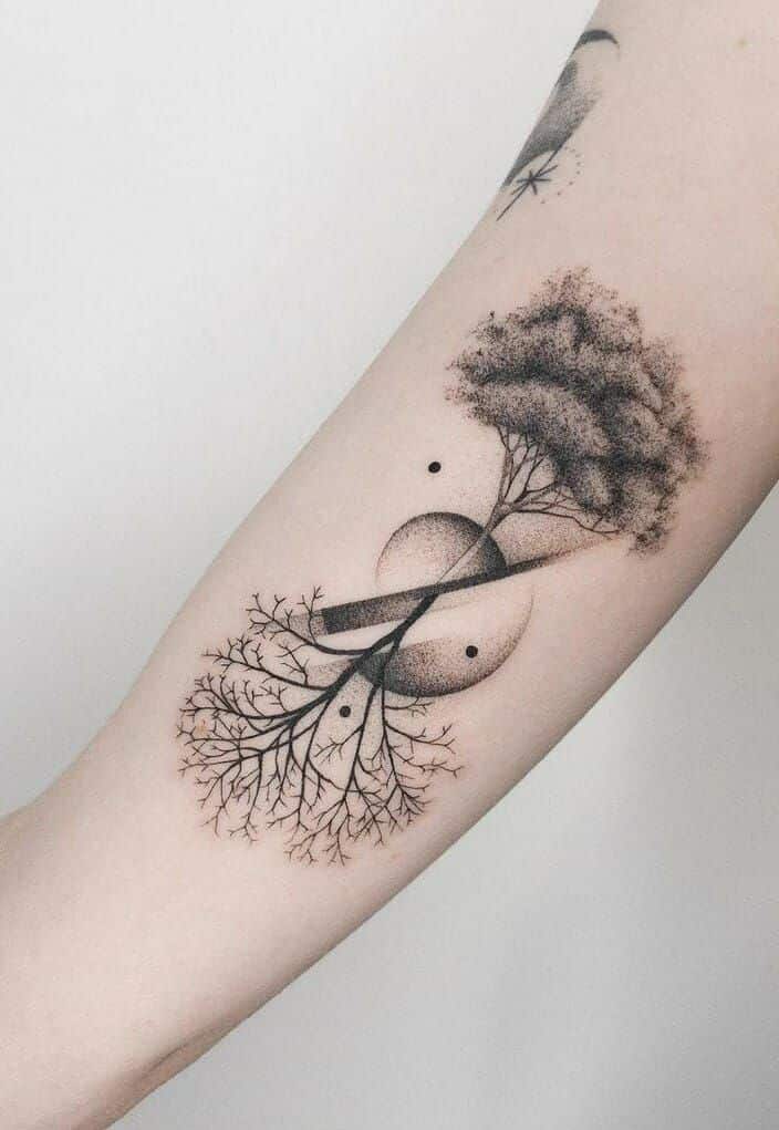 Detailed tree tattoo with roots and branches on forearm, featuring dotted shading and geometric elements.