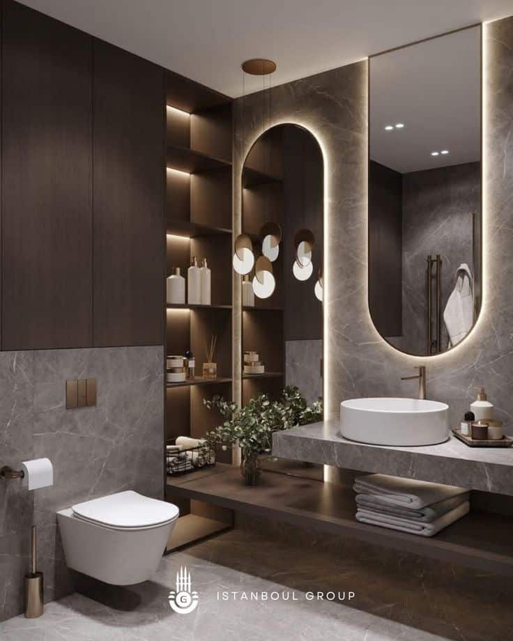 Modern bathroom with floating vanity, large mirror, and ambient lighting. Minimalist design with sleek fixtures.