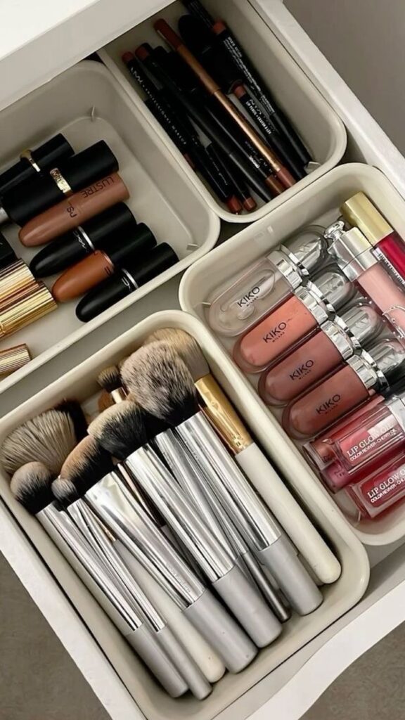 Transform Your Space with Brilliant Home Organization Ideas Organized makeup drawer with lipsticks, brushes, lip glosses, and pencils for a neat and stylish beauty collection. | Sky Rye Design Organized makeup drawer with lipsticks, brushes, lip glosses, and pencils for a neat and stylish beauty collection.