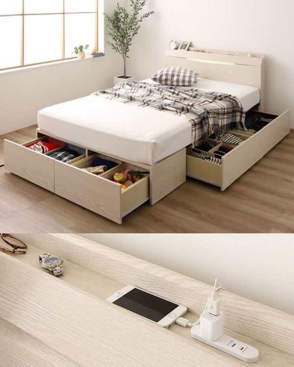 Modern bed with built-in storage drawers and charging station, featuring a cozy plaid blanket and smartphone on nightstand.