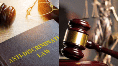 Anti-discrimination law book and gavel symbolizing justice and legal fairness in the courtroom setting.