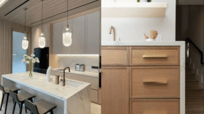 Modern kitchen design with marble island and pendant lights, wooden cabinets adding a warm contrast.