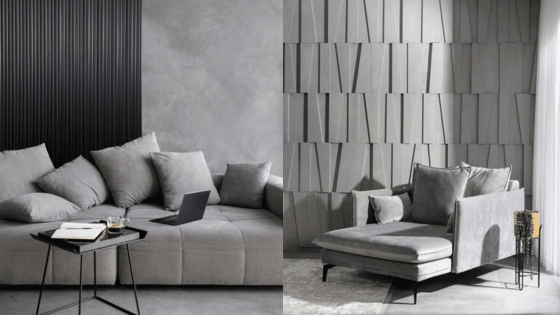 Modern gray living room with stylish sofas, laptop, books, and geometric wall panels. Cozy and contemporary interior design.