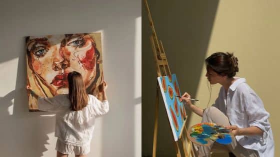 Artist creating vibrant portraits on canvas in sunny studio setting.