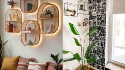 Stylish living room decor with wicker shelves, plants, and a black-and-white photo wall, cozy pillows on a sofa.