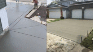 Freshly laid concrete driveway with smooth finish and precise lines in residential area.