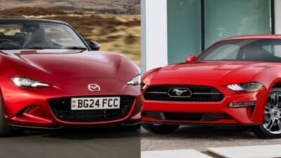 Red Mazda MX-5 and Ford Mustang side by side, showcasing sleek design and sporty features.