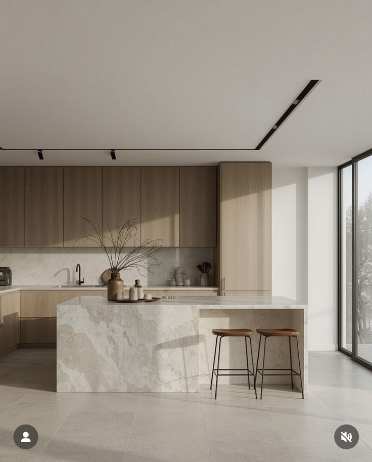 Screenshot Modern kitchen interior with marble island, wooden cabinets, and large window for natural light. | Sky Rye Design Modern kitchen interior with marble island, wooden cabinets, and large window for natural light.