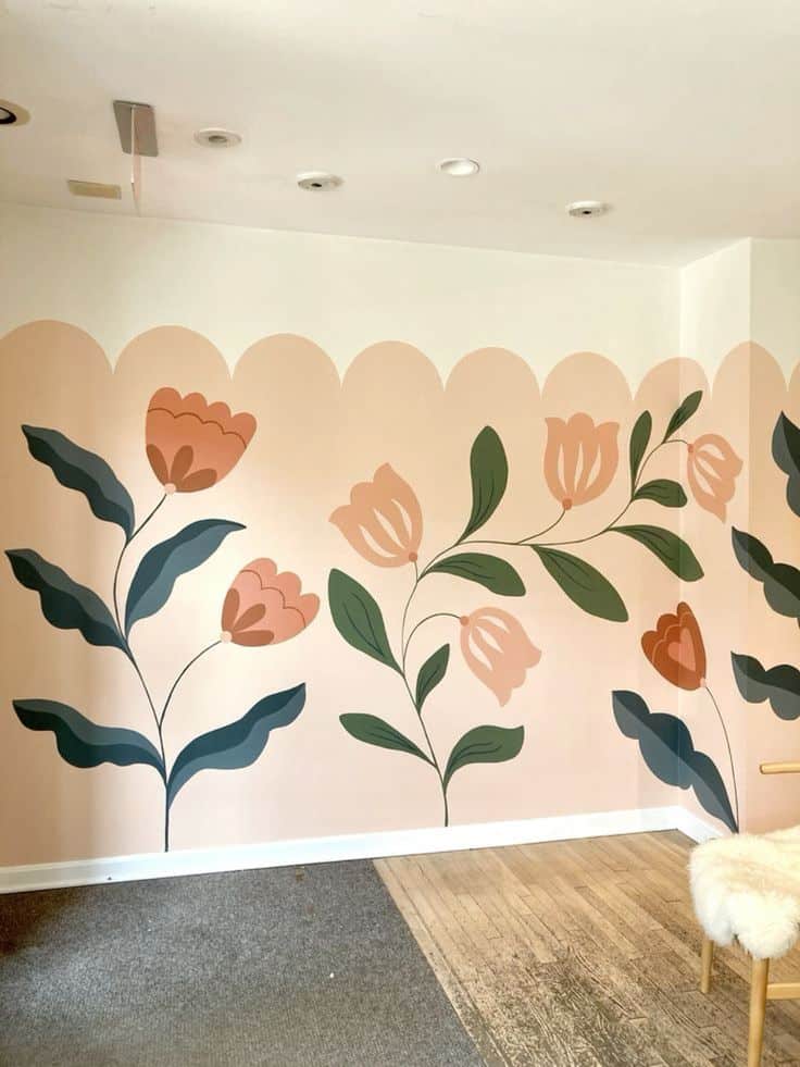 Decorative wall mural with stylized orange and pink flowers, green leaves on a peach background, cozy modern vibe.