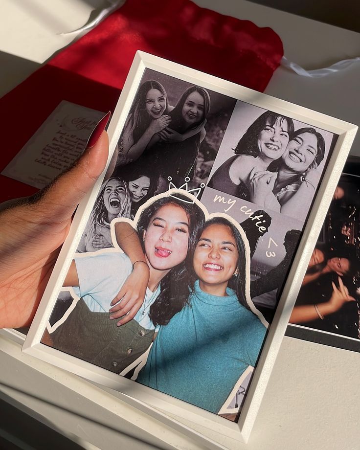 b4f37f7f-9563-4e81-81bb-c5e67ecda53f Collage of friends smiling and laughing, held in a frame. Hand holding the frame with loving memories. | Sky Rye Design Collage of friends smiling and laughing, held in a frame. Hand holding the frame with loving memories.