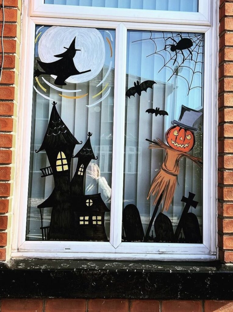 c7660dd2d5baffff087dda158bb9a021 Halloween window decorations with witch, haunted house, scarecrow, bats, and spider web. | Sky Rye Design Halloween window decorations with witch, haunted house, scarecrow, bats, and spider web.
