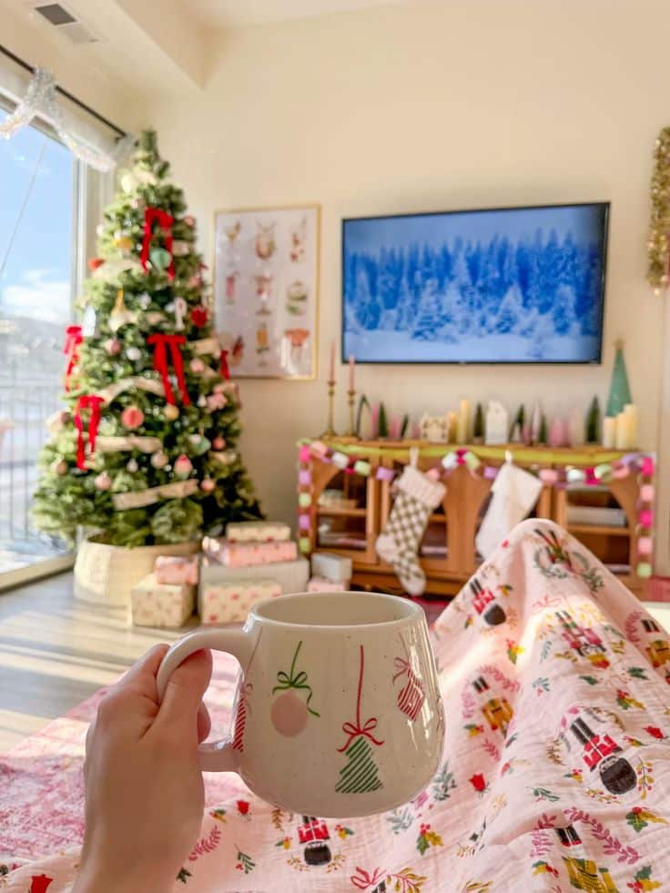 colorful cozy holiday home Cozy Christmas morning with a festive mug, decorated tree, gifts, and stockings by the fireplace. | Sky Rye Design Cozy Christmas morning with a festive mug, decorated tree, gifts, and stockings by the fireplace.