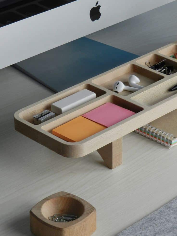 d9f262ecca7516cc2da6c2eef61c20f4 Wooden desk organizer with stationery and tech accessories beneath a computer monitor. Minimalist workspace setup. | Sky Rye Design Wooden desk organizer with stationery and tech accessories beneath a computer monitor. Minimalist workspace setup.