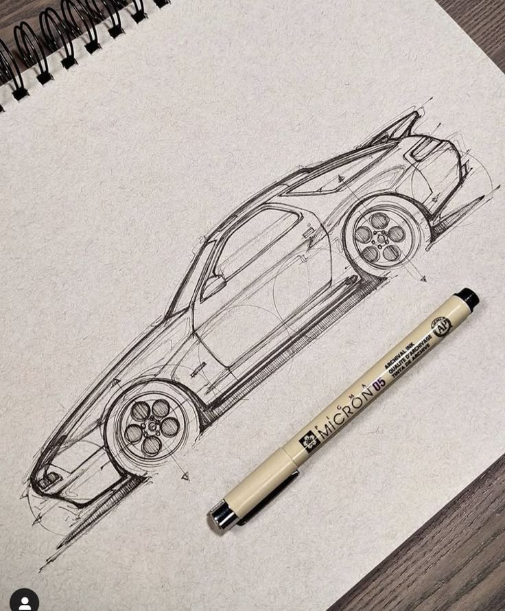 da011db0cf956f28f065fad6b217b2a6 Sketch of a sports car on paper with a Micron pen beside it. | Sky Rye Design Sketch of a sports car on paper with a Micron pen beside it.