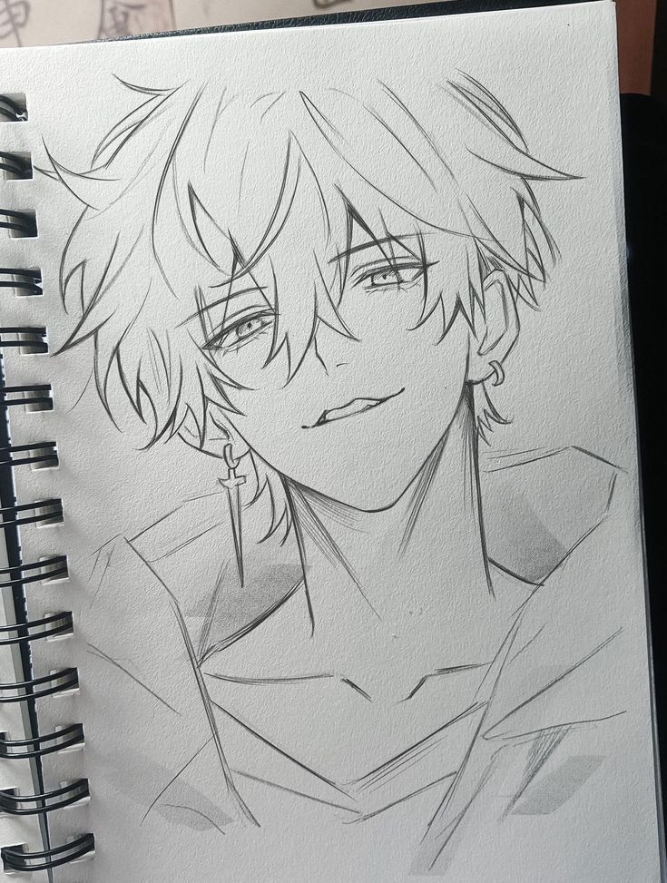 de24864220843f329f3dd94214e16364 Anime-style character sketch with messy hair and cross earring, drawn in a spiral-bound sketchbook. | Sky Rye Design Anime-style character sketch with messy hair and cross earring, drawn in a spiral-bound sketchbook.