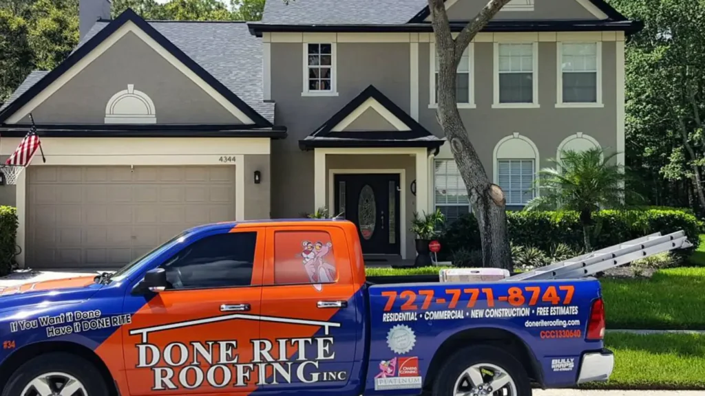 done-rite-roofing-og-4 Roofing company's branded truck parked outside a residential house, showcasing professional roofing services. | Sky Rye Design Roofing company's branded truck parked outside a residential house, showcasing professional roofing services.