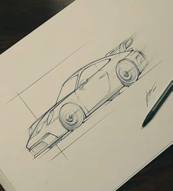 f188fb427d9042850974589bf378b75a Pencil sketch of a sleek sports car design on paper with a pen on the side. | Sky Rye Design Pencil sketch of a sleek sports car design on paper with a pen on the side.