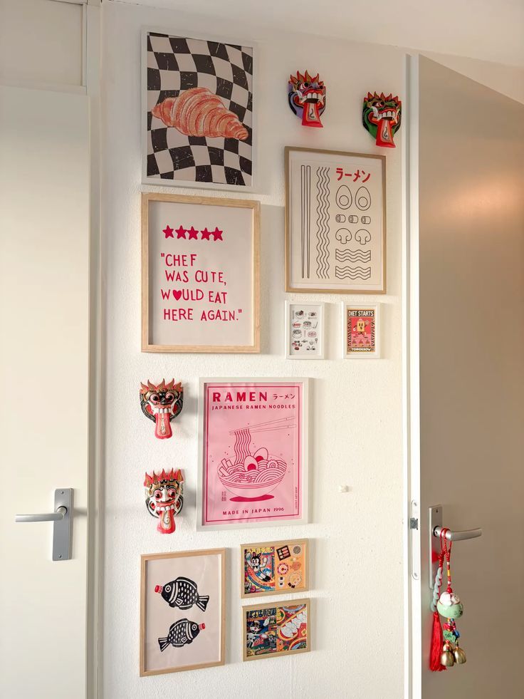 f7fb0611-b131-41bc-8187-f8b0a9fca7f6 Eclectic wall art with ramen, croissant, and masks, adding cultural flair to a modern hallway. | Sky Rye Design Eclectic wall art with ramen, croissant, and masks, adding cultural flair to a modern hallway.