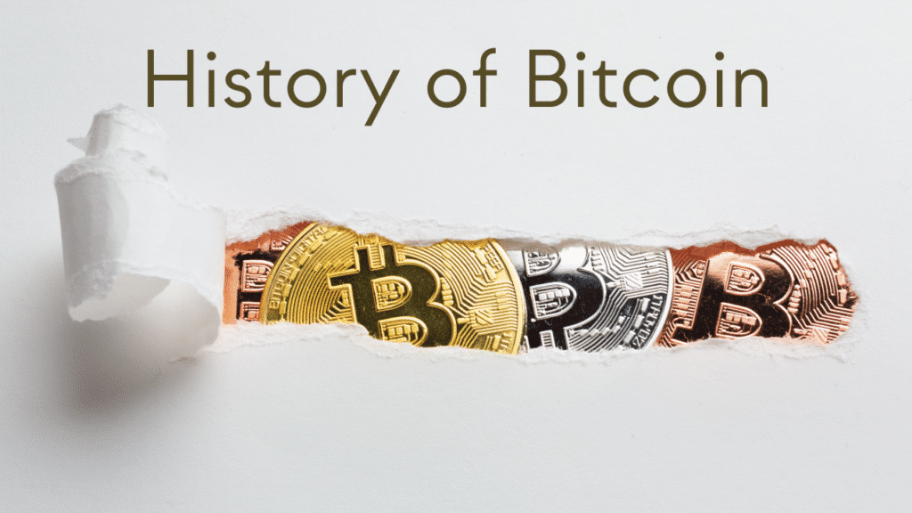 image Text History of Bitcoin above torn paper revealing various Bitcoin coins. | Sky Rye Design Text History of Bitcoin above torn paper revealing various Bitcoin coins.