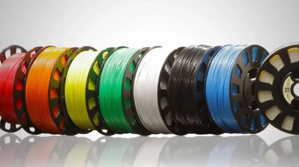image4 Colorful spools of 3D printing filament lined up in a row, showcasing a variety of vibrant hues. | Sky Rye Design Colorful spools of 3D printing filament lined up in a row, showcasing a variety of vibrant hues.